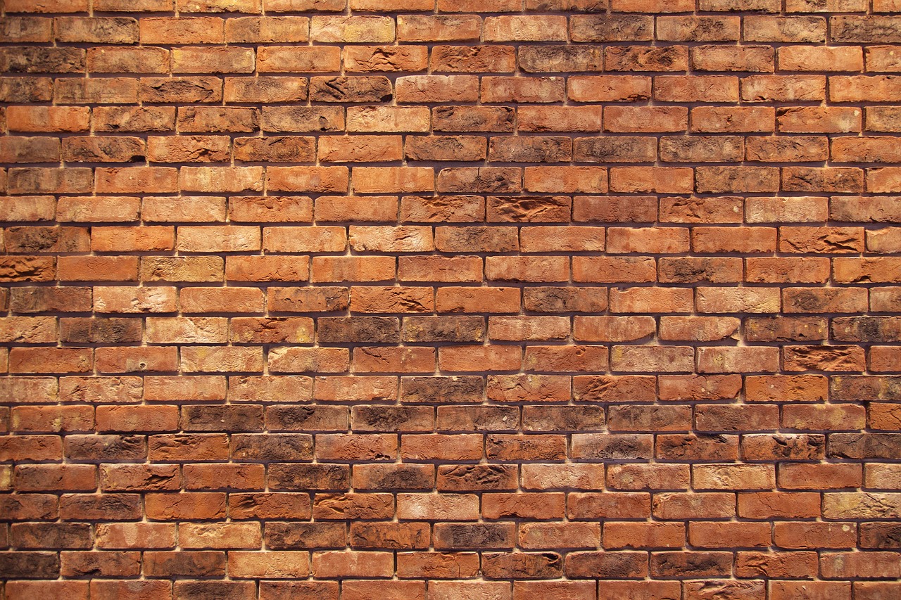 Exposed red brick wall